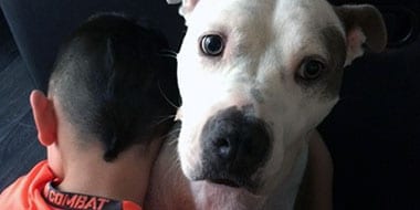 The Lowenstein's son and his dog, Mia The Lowenstein's son and his dog, Mia